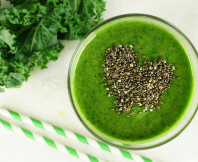 Green kale smoothie with chia seeds heart