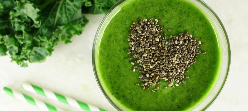 Green kale smoothie with chia seeds heart