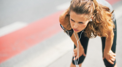 Portrait Of Tired Fitness Young Woman Outdoors In The City Catch